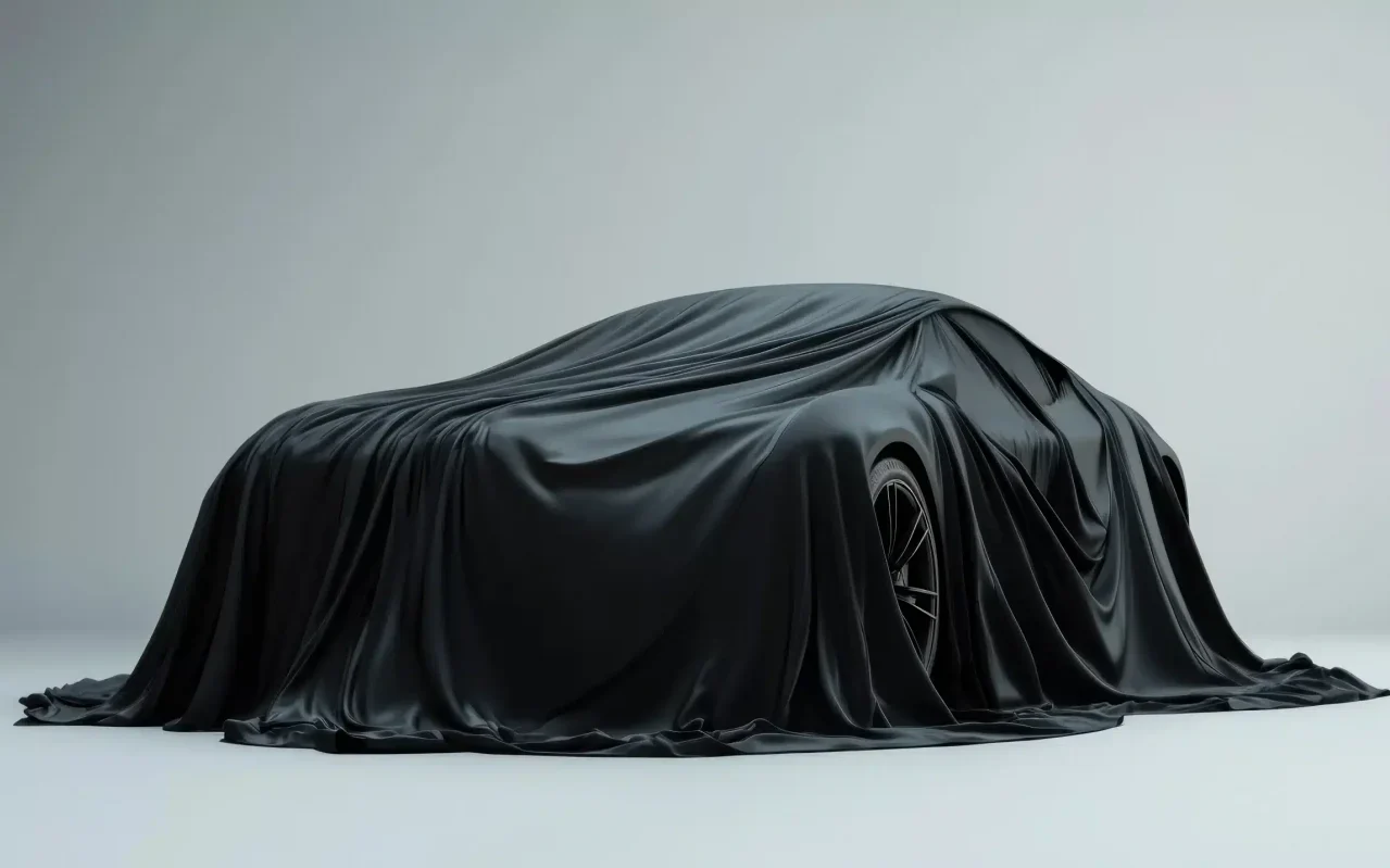 carro tapado com lençol preto